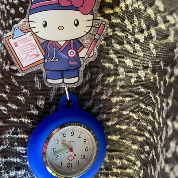 Hello Kitty Nurse-Themed Blue Clip On Timepiece - Picture 2 of 3